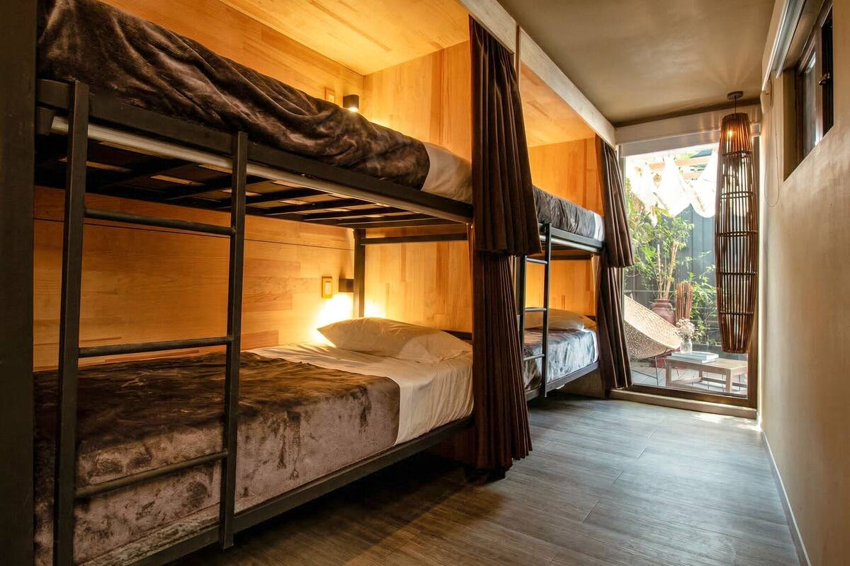 Premium bedding, blackout curtains, iron/ironing board (on request)