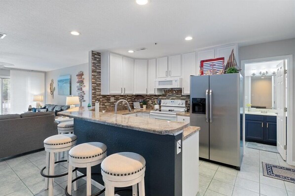 Condo, Plusieurs lits, patio (No Plans Paradise) | Cuisine privée