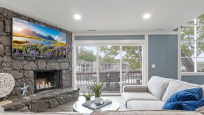 Condo, Multiple Beds, Patio (Castaway Cove Unit 3) | Living area - Our Cove Retreat - Perfect for Wave-free Swimming, Tanning & Prime Location Fun! (Lake Ozark)
