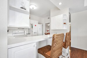 Condo, Multiple Beds, Pool Access (Second Wind) | Private kitchen - Breathtaking Views - Two Pools - Enclosed Balcony (Lake Ozark)