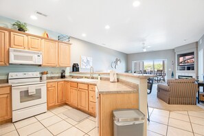 Bloc d'apartaments, diversos llits, pati (Paradise Point) | Cuina privada