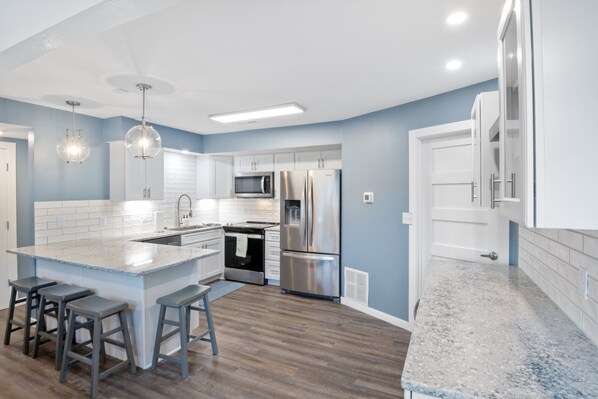 Bloc d'apartaments, diversos llits, pati (Castaway Cove Unit 9) | Cuina privada