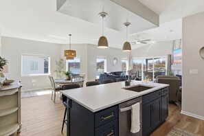 Condo, Multiple Beds, Pool Access (High Tide Hideaway) | Interior - Main Channel Views, Screened Porch, Pool & Boat Slip (Lake Ozark)