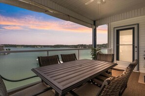 Condo, Multiple Beds, Pool Access (High Tide Hideaway) | Outdoor dining - Main Channel Views, Screened Porch, Pool & Boat Slip (Lake Ozark)