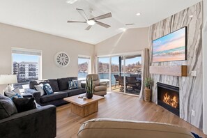 Condo, Multiple Beds, Pool Access (High Tide Hideaway) | Living area - Main Channel Views, Screened Porch, Pool & Boat Slip (Lake Ozark)
