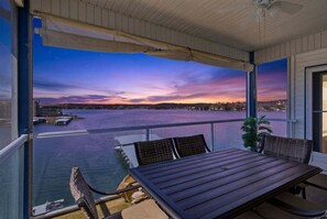 Condo, Multiple Beds, Pool Access (High Tide Hideaway) | Outdoor dining - Main Channel Views, Screened Porch, Pool & Boat Slip (Lake Ozark)