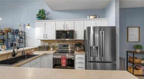 Condo, Multiple Beds, Pool Access (No Wake Zone) | Private kitchen - Boat Slip, 3 Pools, Golf, Ozarks Ampitheater, & Amazing Lake Views at the 13mm Big Niangua (Camdenton)