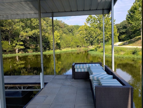 Newly Updated in a Private Cove, With Firepit, Flat Lawn, Dock, Boat Slip & Kayaks in Osage Beach