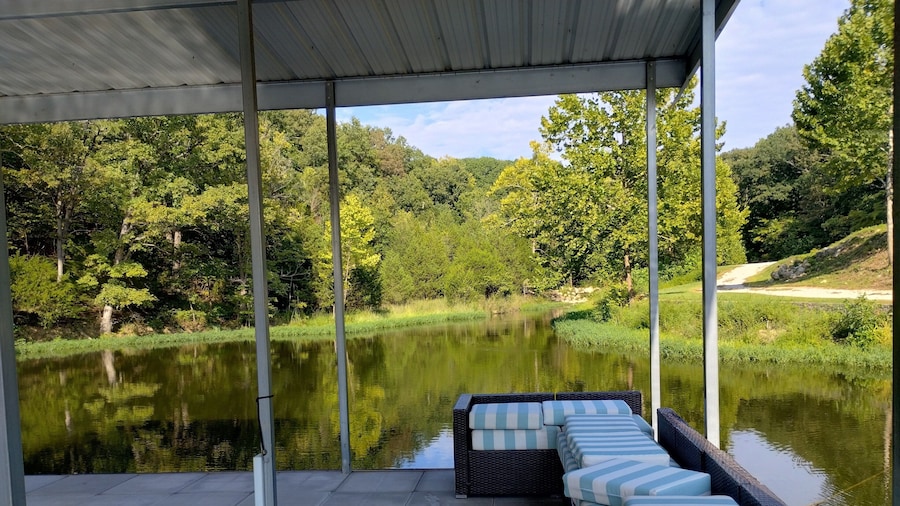 Newly Updated in a Private Cove, With Firepit, Flat Lawn, Dock, Boat Slip & Kayaks in Osage Beach