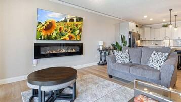 Appart'hôtel, plusieurs lits, patio (Lookout Lodge) | Coin séjour