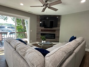 Living area - Our Cove Retreat - Perfect for Wave-free Swimming, Tanning & Prime Location Fun! (Lake Ozark)