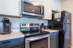 Condo, Multiple Beds, Pool Access (Blue Haven) | Private kitchen - Lake Views, Lakefront Pool, Great Location! (Lake Ozark)