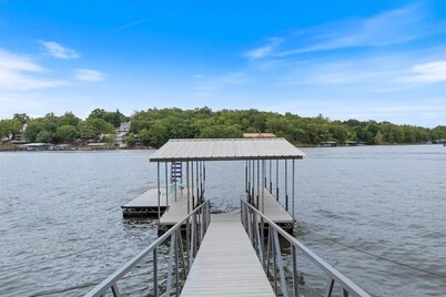 Lakefront Fishing Retreat w/ Dock, Hot Tub & Deck Views