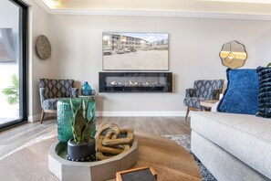 Condo, Multiple Beds, Pool Access (Seas The Day) | Living area - Scenic Views, Outdoor Grill & Dine, Fireplace, Games (Osage Beach)