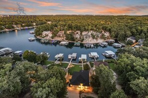 Aerial view - Porto Cima w/ Game Room, Dock, Boat Slip, Kayaks, Lakeside Fireplace & Hot Tub (Sunrise Beach)