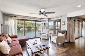 Condo, Multiple Beds, Pool Access (Happy Daze) | Living area - Stunning Views, Inviting Pools, and Endless Fun! (Osage Beach)