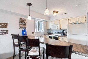 Condo, Multiple Beds, Patio (Cozy Cove Escape) | Private kitchen