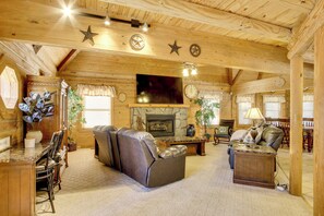 TV, fireplace, books