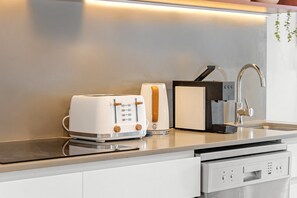 Apartment | Private kitchen | Cookware/dishes/utensils - Stylish West End Stay With Rooftop Pool & BBQ (Brisbane)