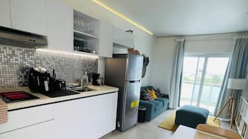 Condo, Balcony, Pool View | Private kitchen | Coffee/tea maker