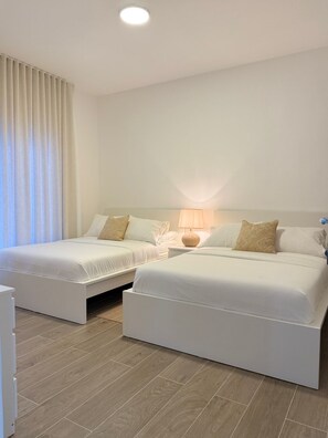 2 quartos, ferros/tábuas de passar roupa, Wi-Fi de cortesia