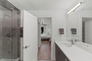 Shower, jetted tub, hair dryer, towels