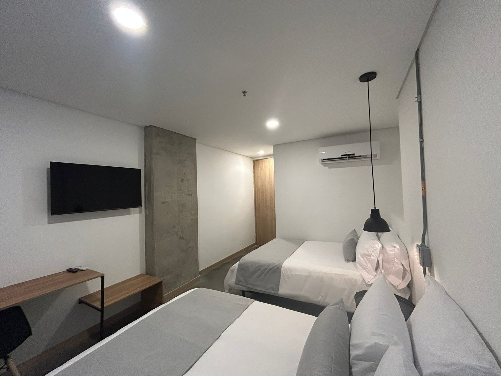 Deluxe Quadruple Room, City View | Desk, free WiFi