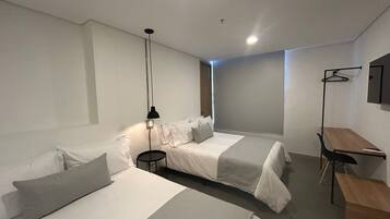 Deluxe Quadruple Room, City View | Desk, free WiFi