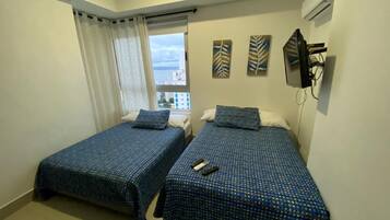 Coffres-forts dans les chambres, fer et planche Ă repasser