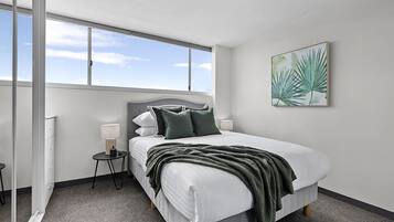 Apartament | 1 dormitori, planxa i posts de planxar i roba de llit