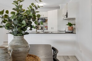 Apartment | Private kitchen | Cookware/dishes/utensils - 3-bed Haven With Balcony and Bbq, 5-min to Beach (Sunshine Coast)