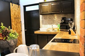 Fridge, microwave, coffee/tea maker, toaster