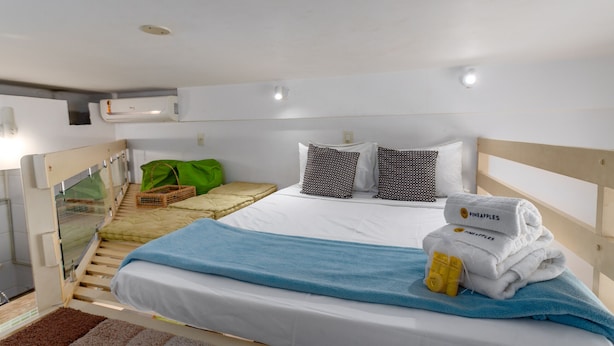A compact hotel room with a bed, a small seating area, and a window. - 1 Minuto Da Praia De Copacabana | A923 (Rio de Janeiro)