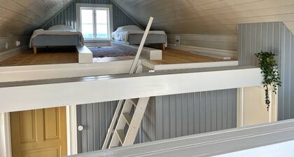 Newly renovated turn of the century house with sea view close to nature!