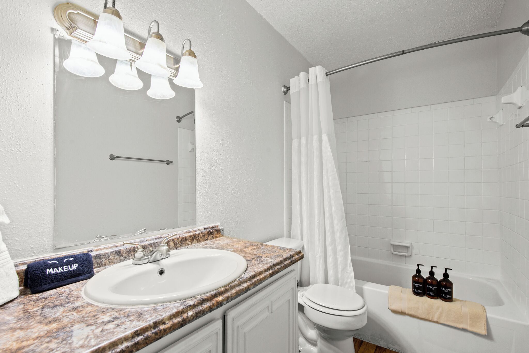 Hair dryer, towels, soap, shampoo