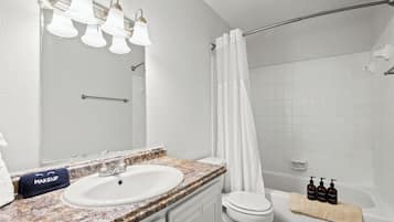 Hair dryer, towels, soap, shampoo
