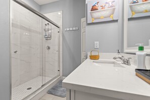 Shower, hair dryer, towels, soap - The Blue Oasis, a beach-themed Florida getaway (Tampa)