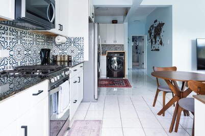 Modern Garden Apartment with Island Charm