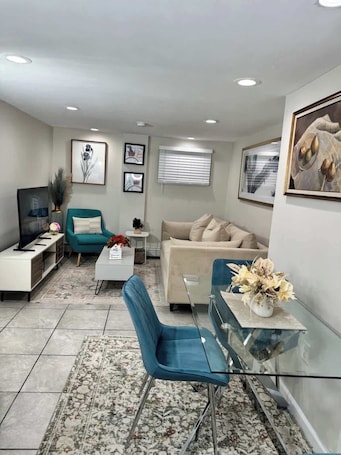 TV, offices. Julie's Cozy 2 Bedroom Basement Apartment