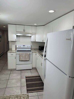 Microwave, stovetop - Julie's Cozy 2 Bedroom Basement Apartment (uniondale)