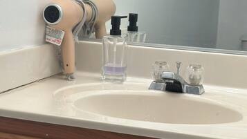 Hair dryer, towels, toilet paper