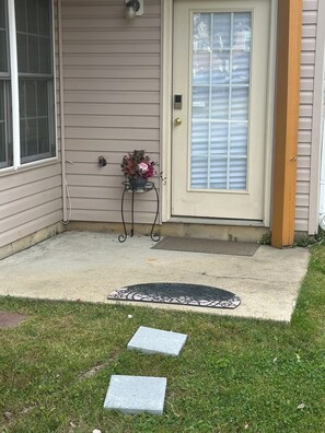 Exterior detail - Private ground-level studio suite (Laurel)