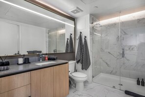 Hair dryer, towels, soap, shampoo