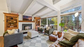 Smart TV, fireplace, books, offices