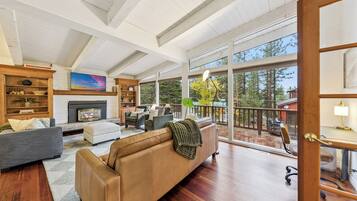 Smart TV, fireplace, books, offices