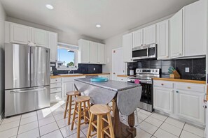 Fridge, microwave, oven, stovetop - Zen Garden - 4BR, Private Pool, Bay Views (South Padre Island)