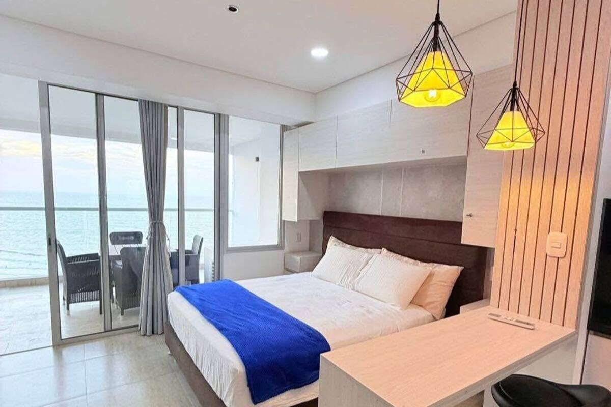 Comfort Quadruple Room, Balcony, Beach View | Laptop workspace, blackout drapes, soundproofing, iron/ironing board