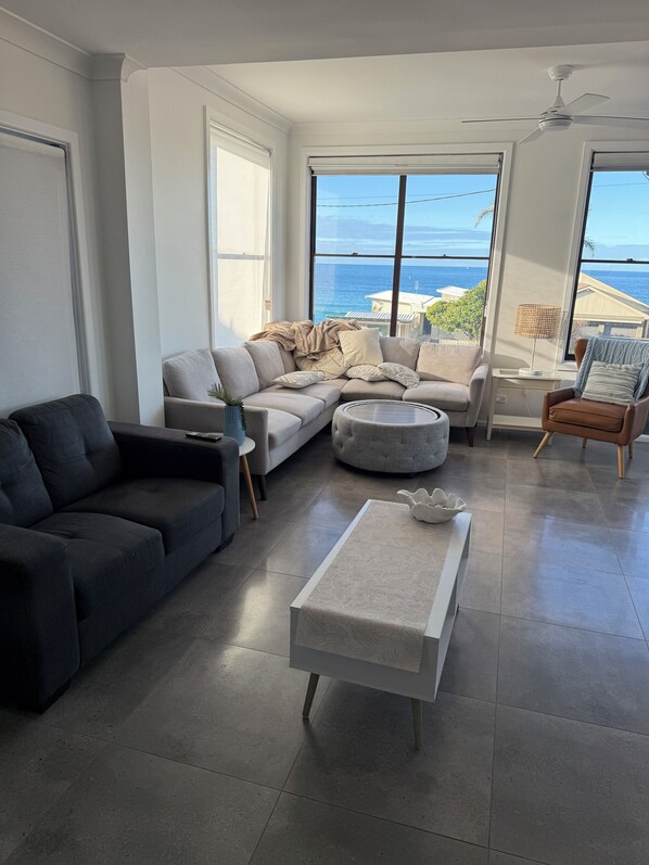 Living area - Family comfort across the road from North Beach (Shellharbour)
