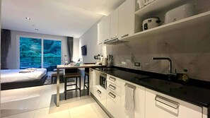 Fridge, microwave, stovetop, coffee/tea maker