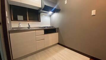 Fridge, microwave, stovetop, cookware/dishes/utensils